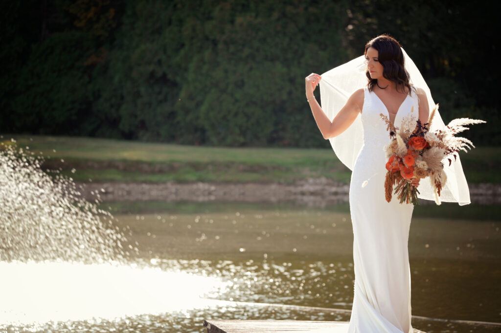 bride at dock on pond