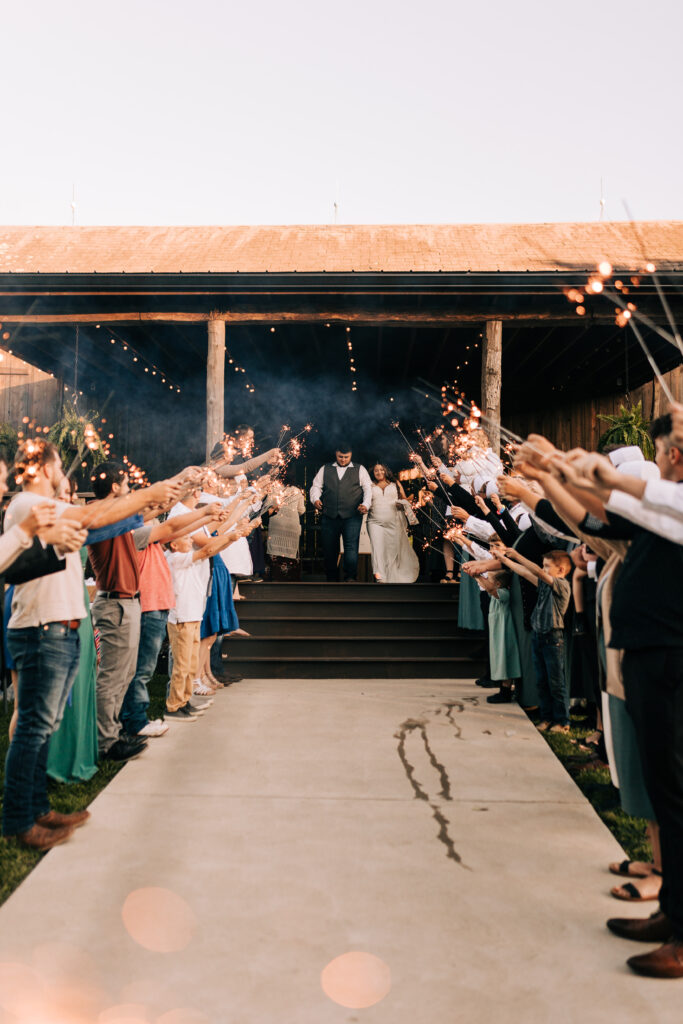 bride and groom sparkler exit from rustic Ohio barn wedding venue