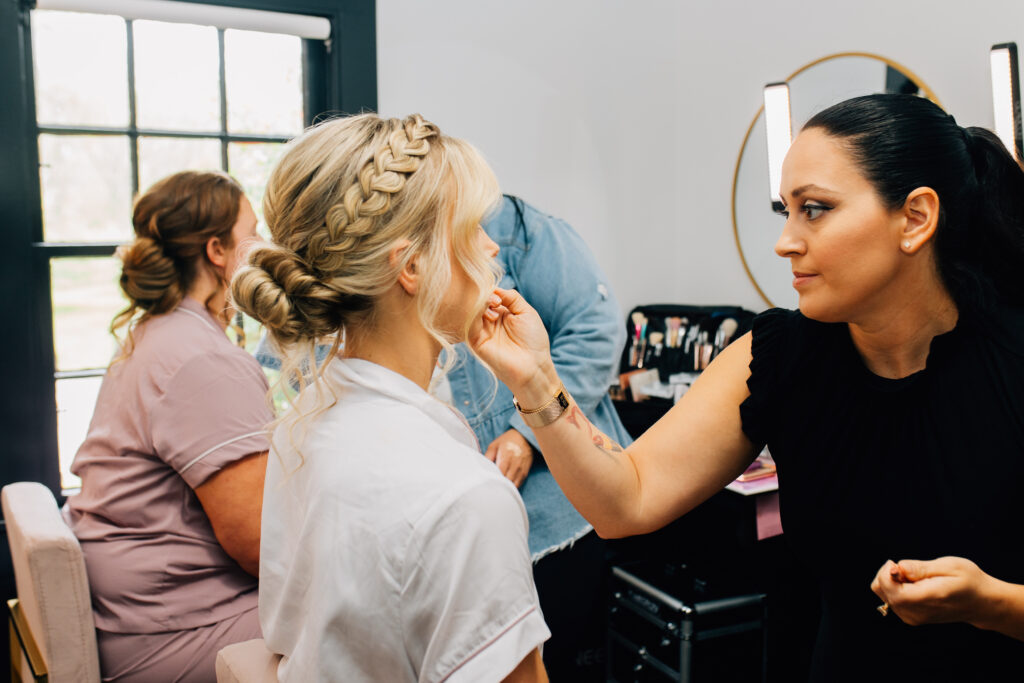 bridal party getting ready in bridal cottage