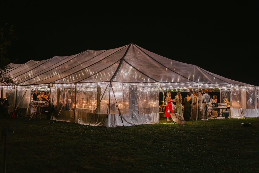 clear outdoor tent reception with lights